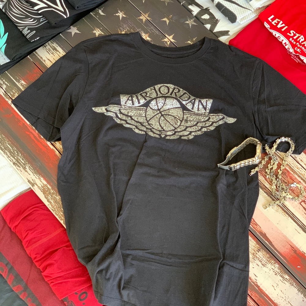 Air Jordan black T (necklace & watch not included)
